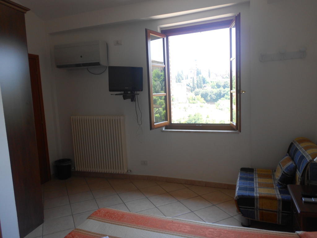 Soggiorno La Primula Siena Quarto foto
